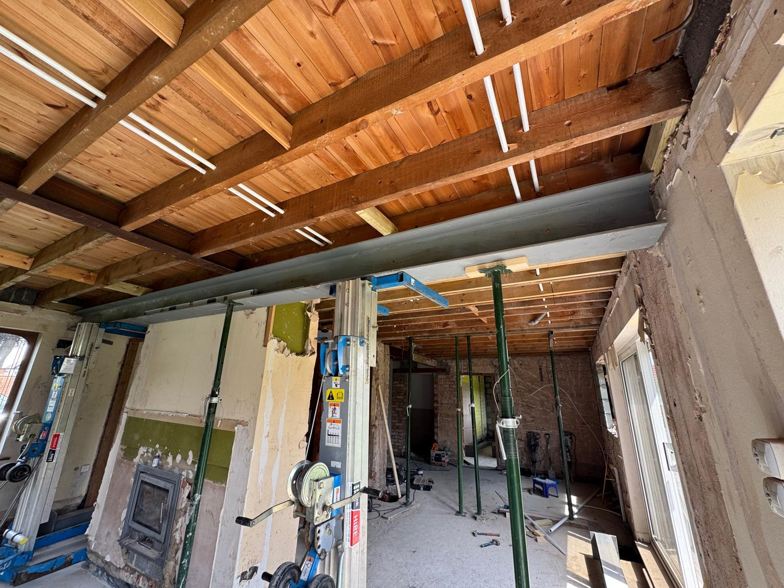 Steel beam installation during residential construction